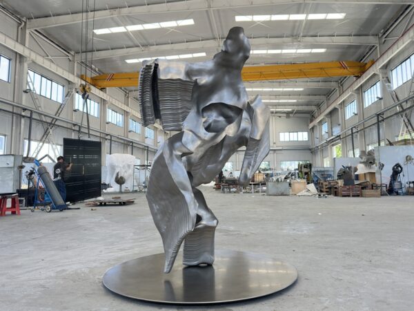 Contemporary Cast Stainless Steel Figure Sculpture